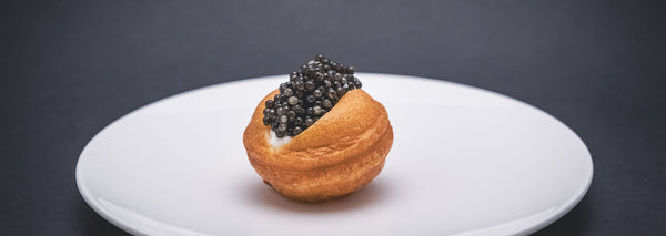 Deepfried doughnut with yogurt and caviar